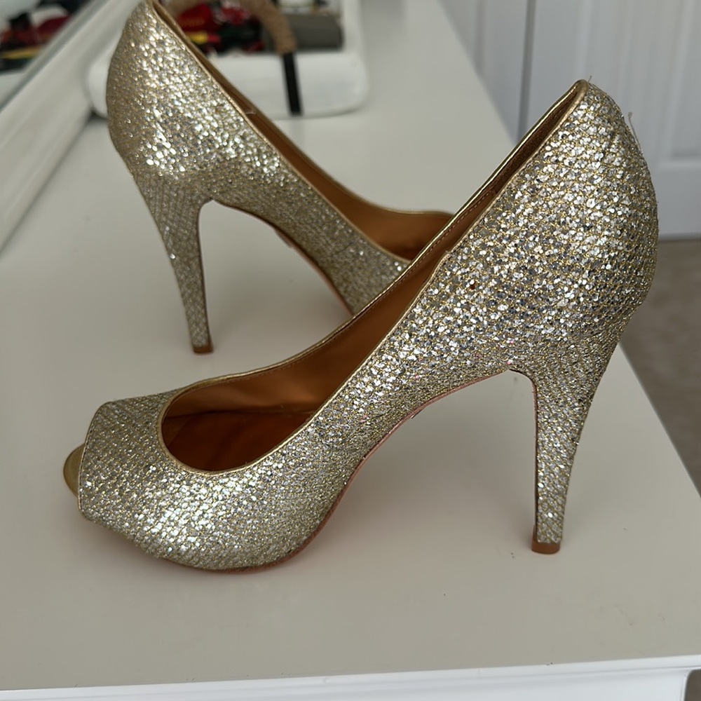 Brand new Badgley Mishka gold pumps.